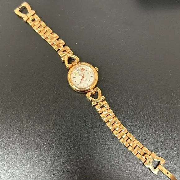 EUC Black Hills Gold women’s Watch with genuine diamonds d & reversible band